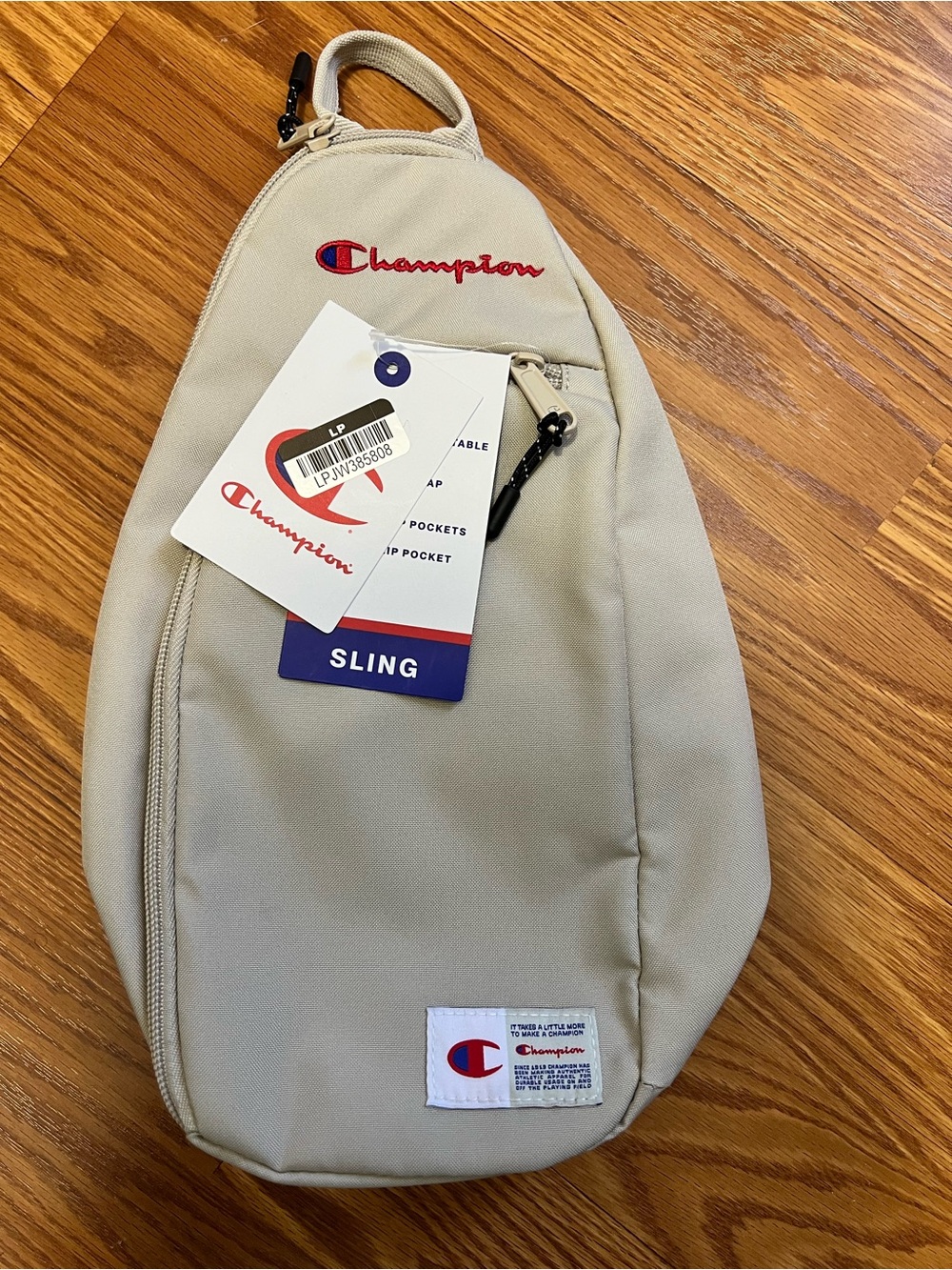 Champion Tan Sling Bag with Red & Blue Logo